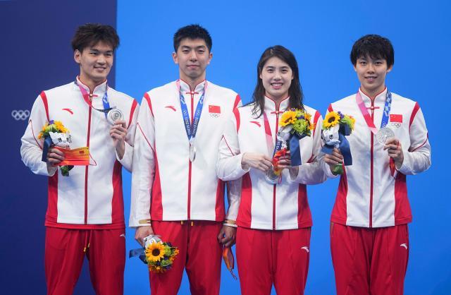 世界杯客户端更新-中国混接夺银仍有遗憾 徐嘉余：明年把纪录破回来
